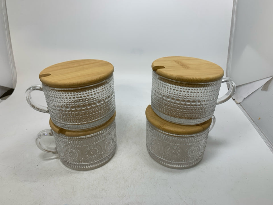 4 TEXTURED MUGS W/ WOOD LIDS.
