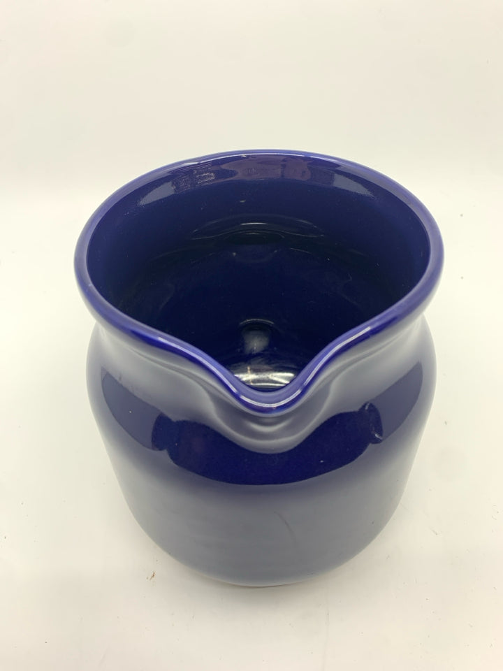 BLUE POTTERY STAMPED PITCHER.