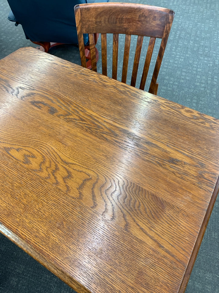 HEAVY WOOD DESK W/2 DRAWERS & CHAIR W/BROWN CUSHION.