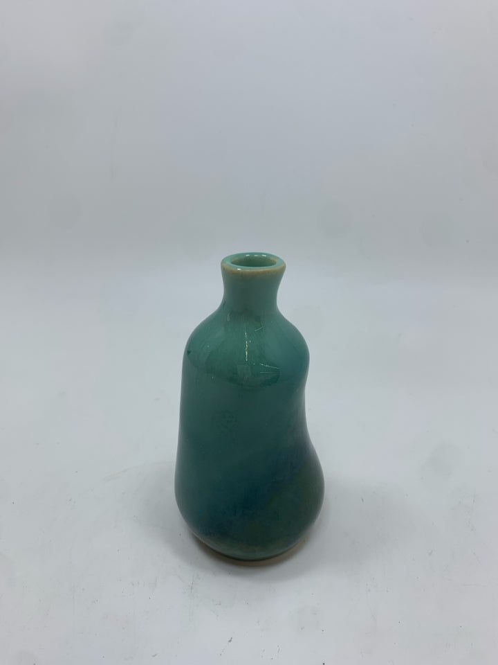 LT BLUE GLAZED BUD VASE.