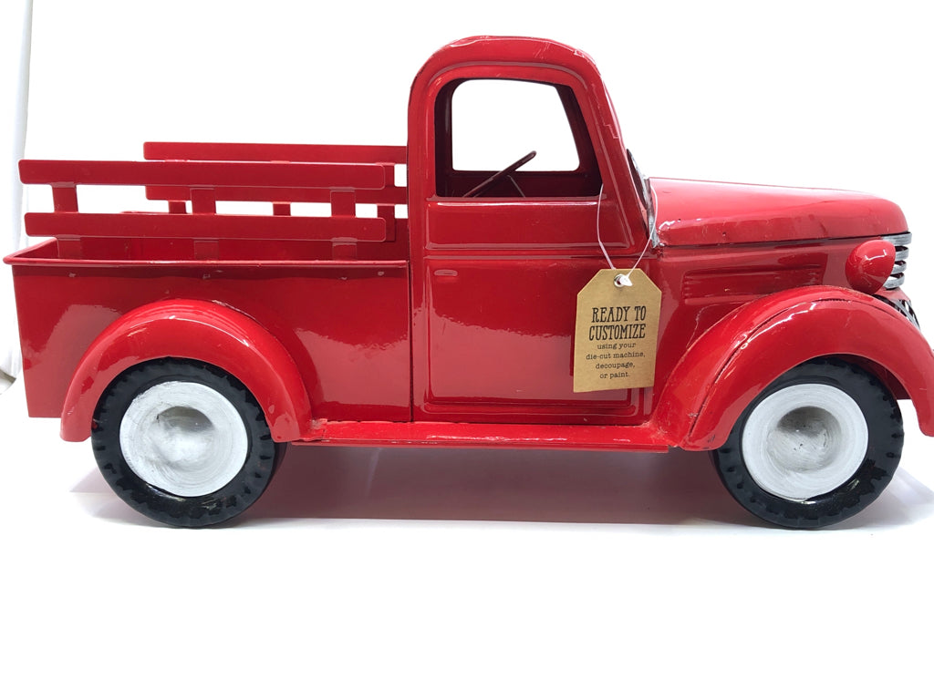 RED PICKUP TRUCK FIGURINE.