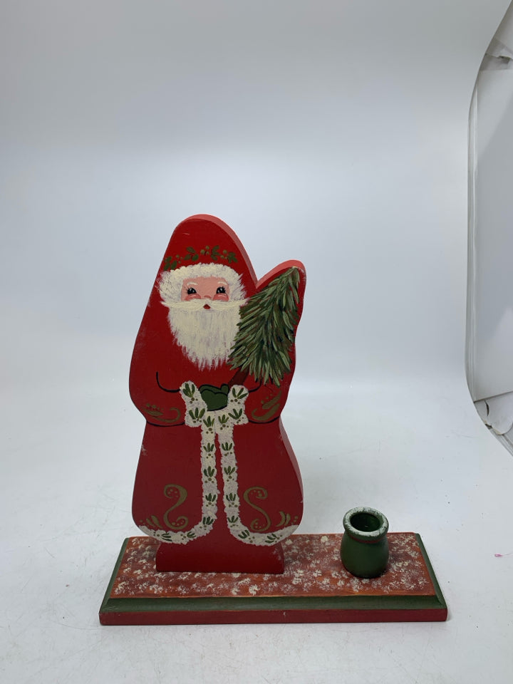 VTG PAINTED WOOD SANTA W/ A TAPERED CANDLE SLOT NEXT TO HIM.