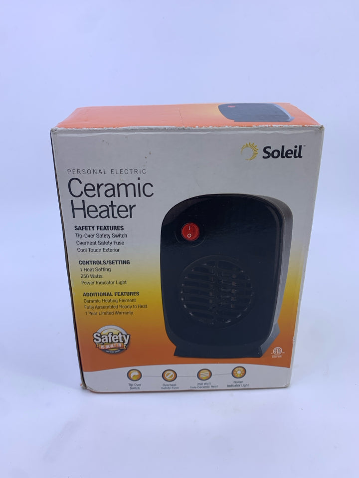 NIB SMALL CERAMIC HEATER.