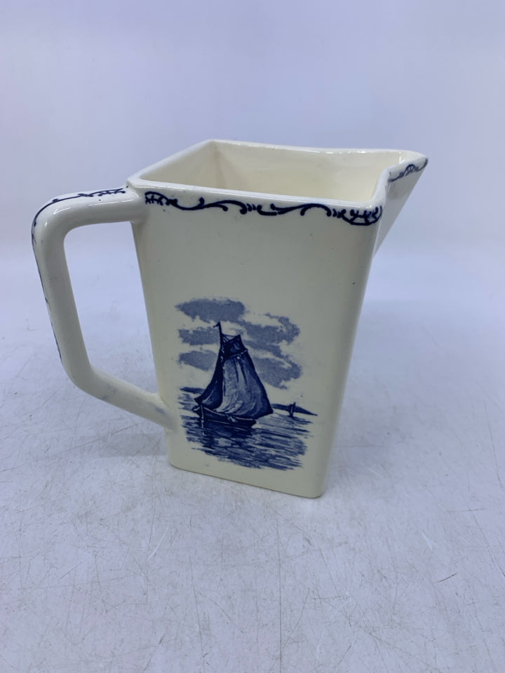 VTG CREAM COLORED W/ BLUE WINDMILL/SAILBOAT CREAMER.