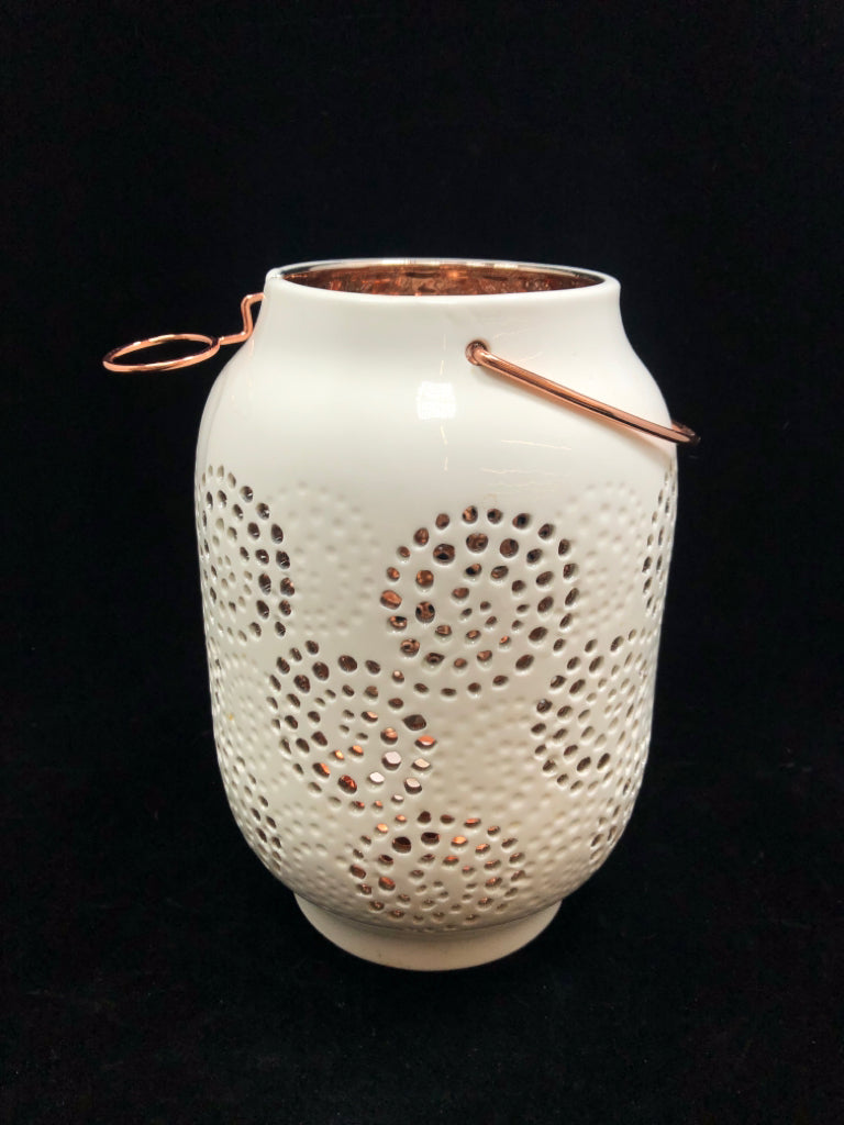 CERAMIC TEA LIGHT LANTERN W/CIRCULAR PATTERN.