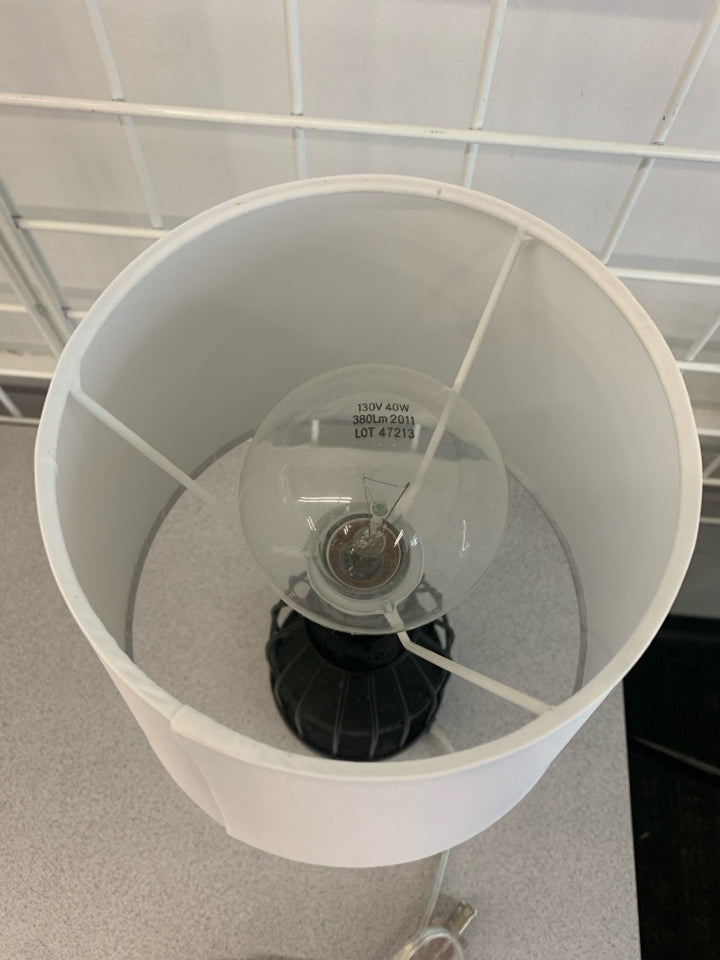 METAL CAGE LAMP WITH WHITE SHADE.