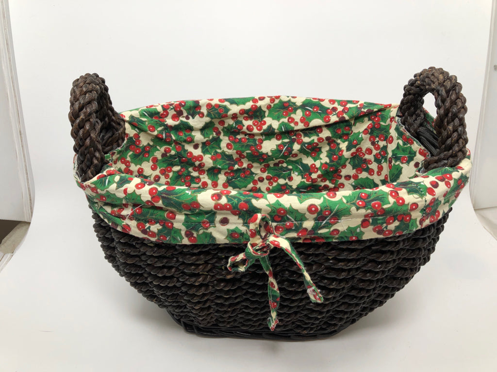 BROWN WICKER BASKET W/HOLLY FABRIC INSERT.