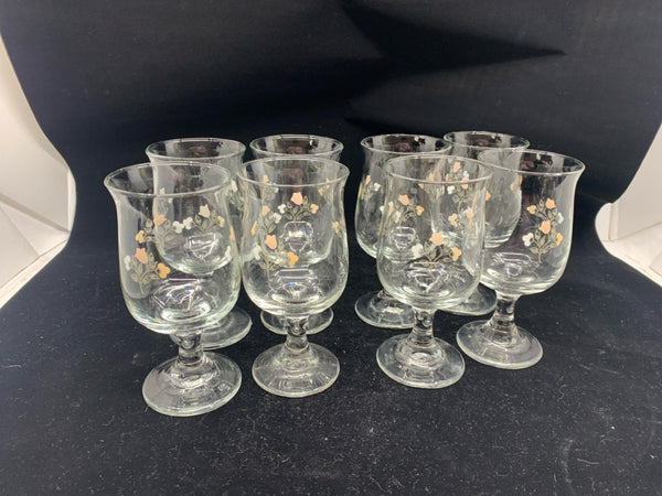 8 FOOTED FLORAL WATER GLASSES.