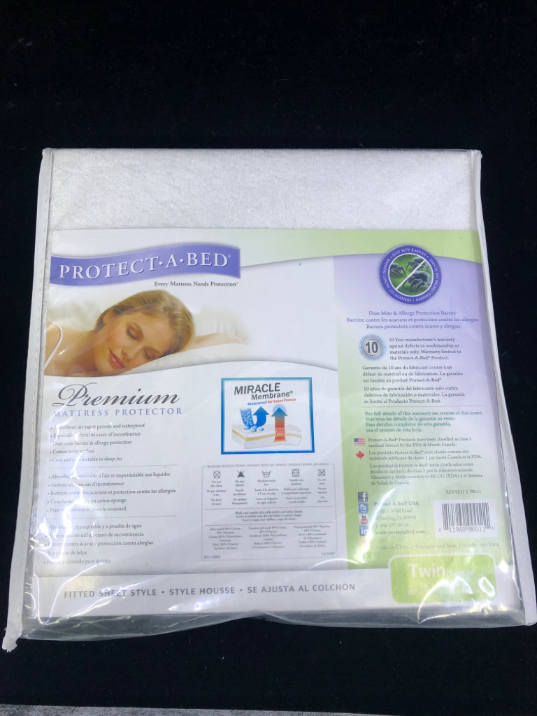 NIP PROTECT A BED TWIN MATTRESS PROTECTOR.