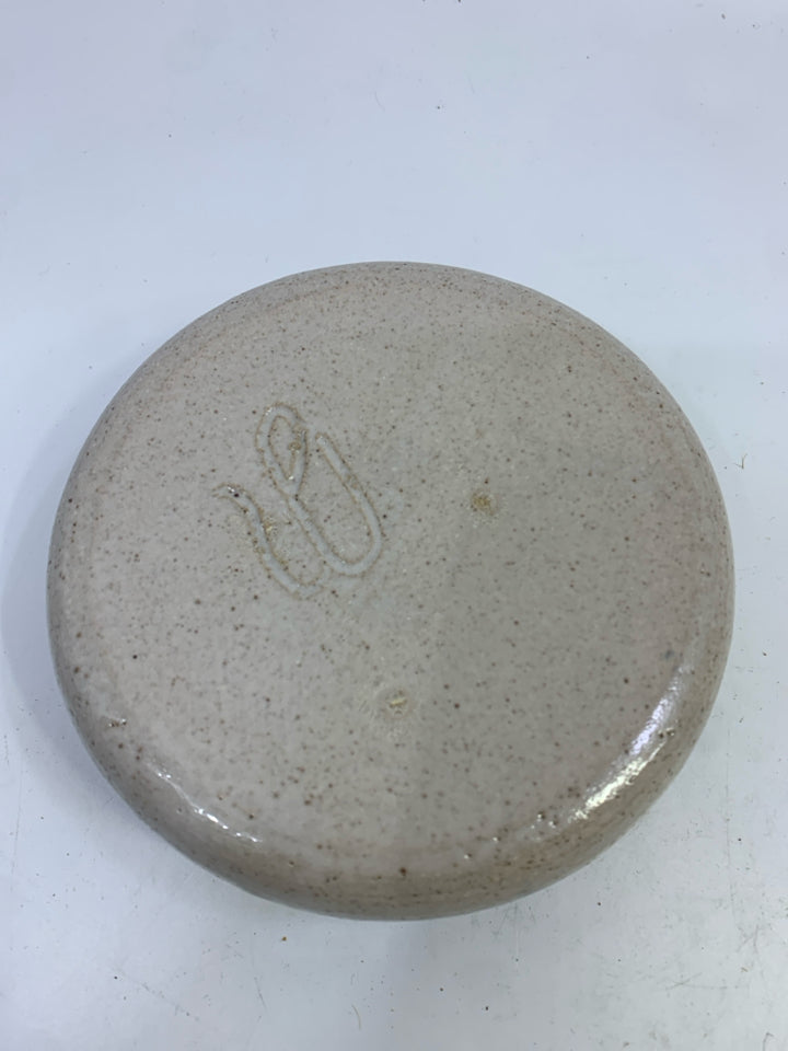 SHALLOW POTTERY DISH W/BLUE SPECKLED RIM.