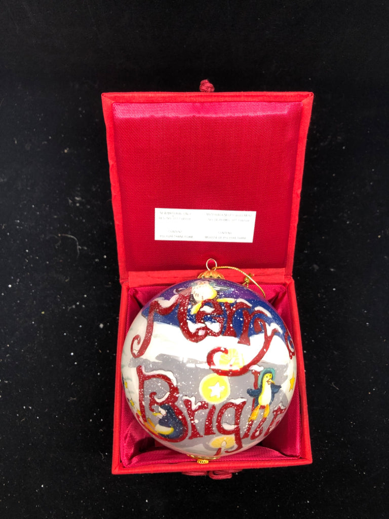 MERRY AND BRIGHT SPHERE ORNAMENT IN RED BOX.