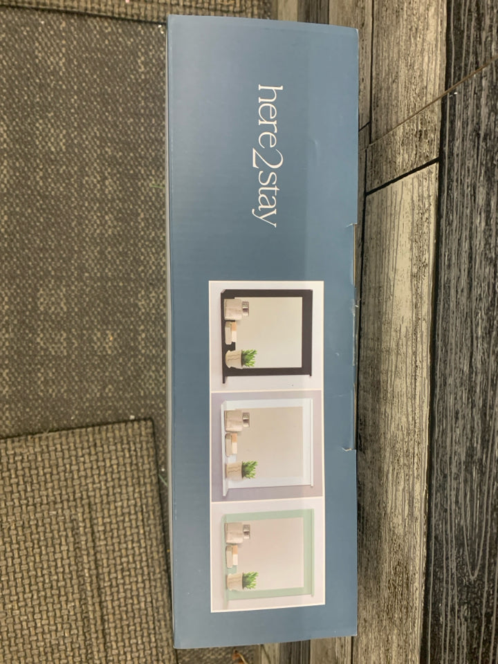 NIB WALL SHELF WITH MIRROR.