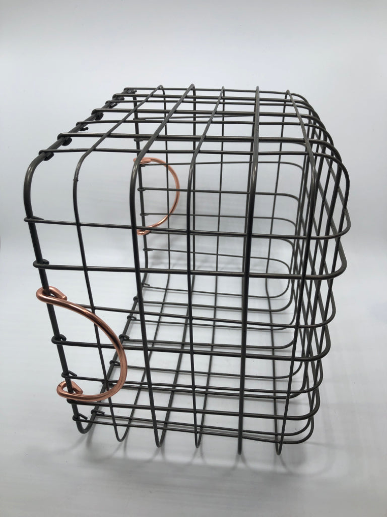 GREY WIRE BASKET W/PINK ROSE HANDLES.