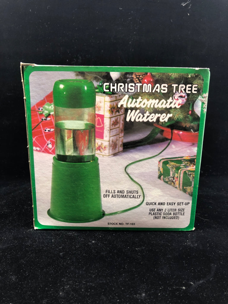 NIB CHRISTMAS TREE AUTOMATIC WATERER.