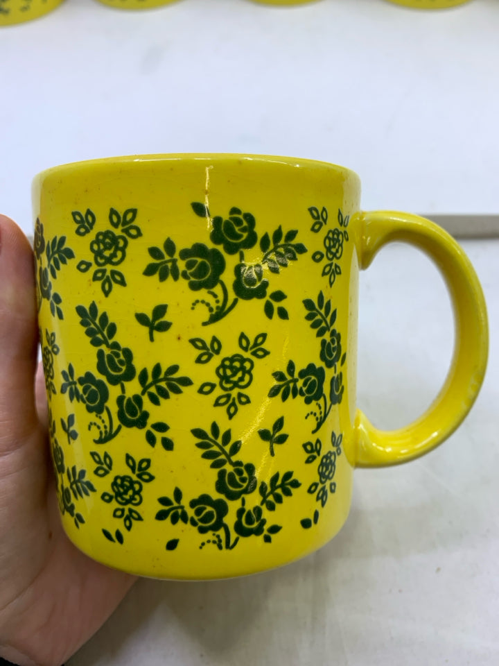 6 YELLOW W/GREEN FLOWERS MUGS.