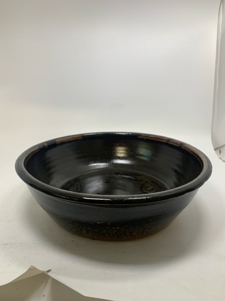 LARGE DARK BROWN DISTRESSED POTTERY BOWL.