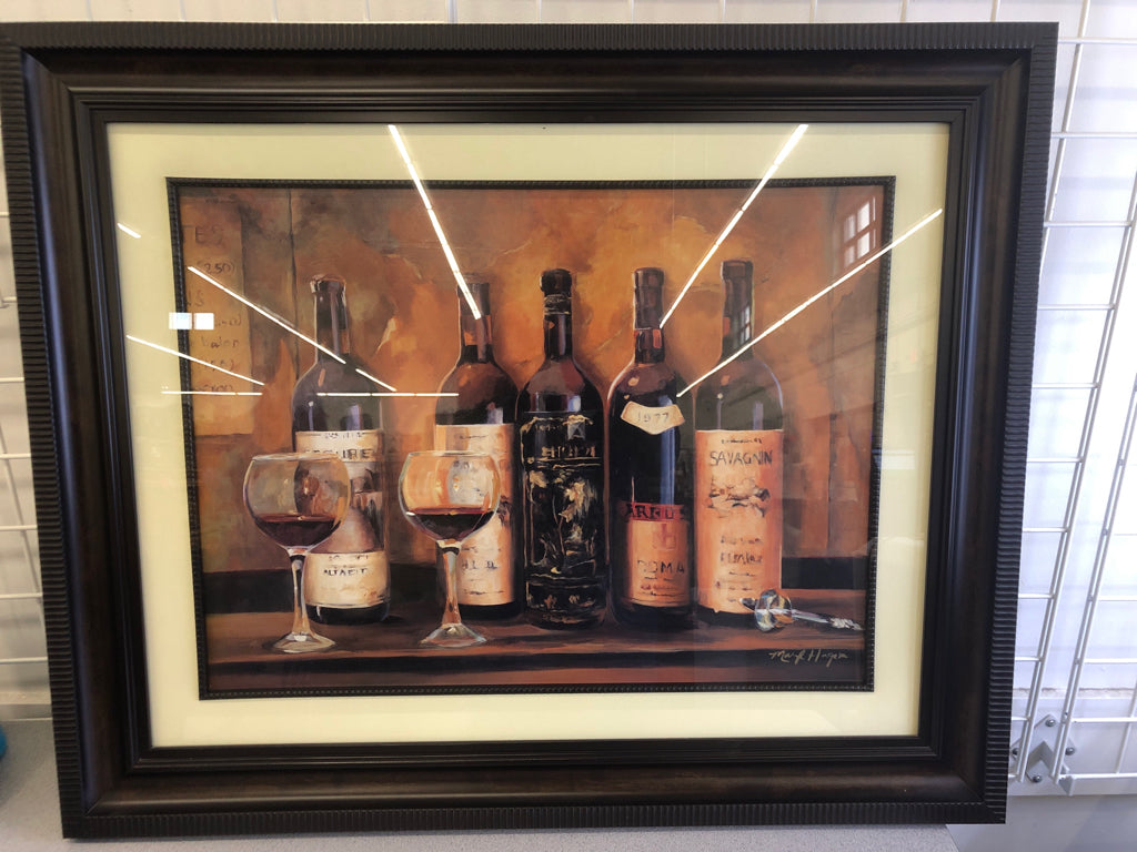 WINE BOTTLES PRINT IN DK WOOD FRAME.