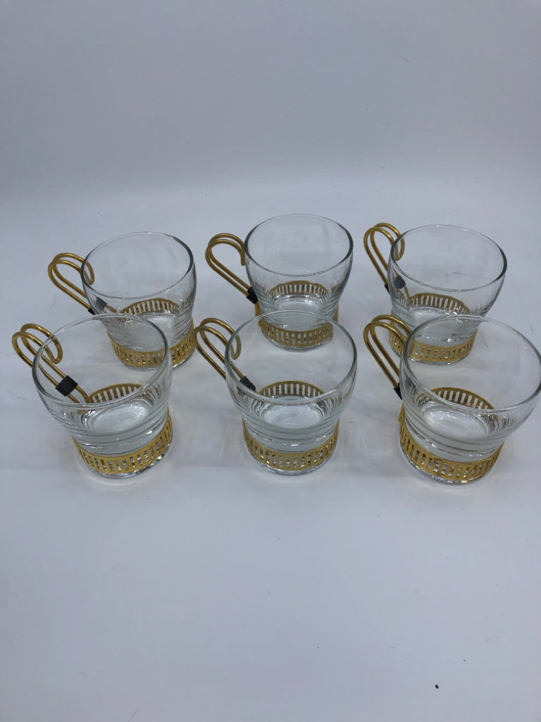 6 GLASS MUGS W GOLD METAL HOLDER + HANDLE.