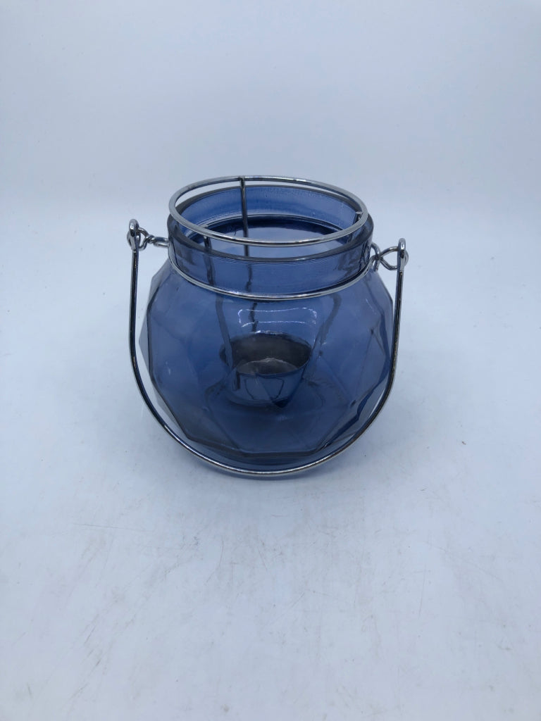 BLUE GLASS TEA LIGHT HOLDER W HANDLE.