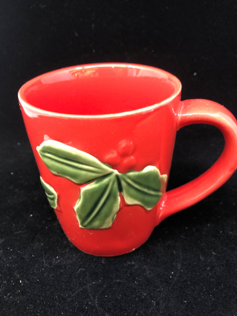4 RED MUG W/ EMBOSSED HOLLY.