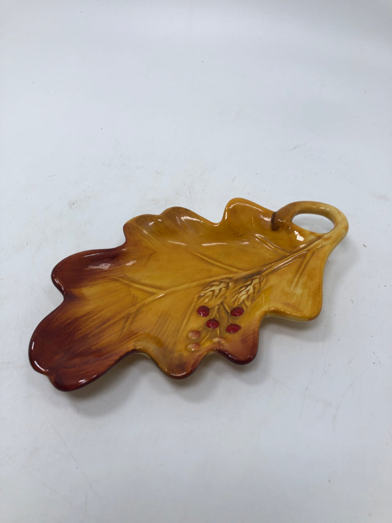CERAMIC ORANGE LEAF DISH.