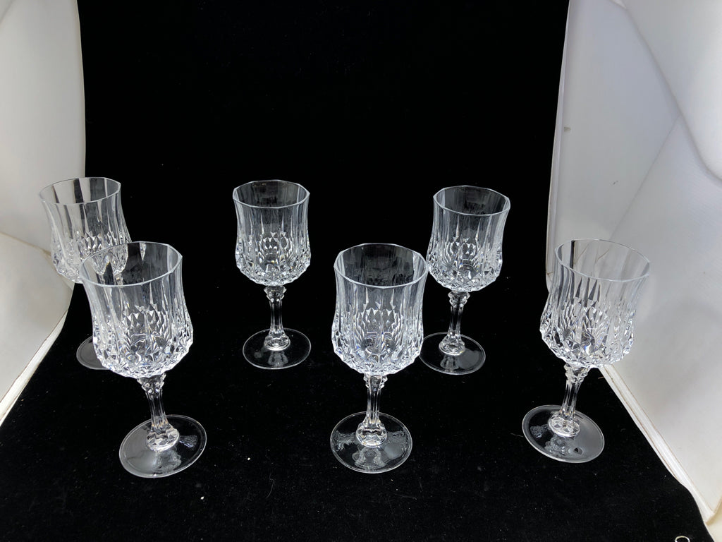 6 TALL CUT CRYSTAL WINE GLASSES.