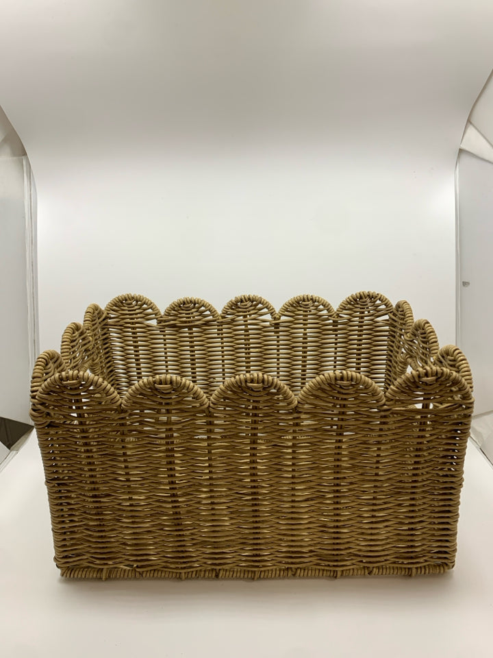 WOVEN BASKET W WAVY RIM AND HANDLES.