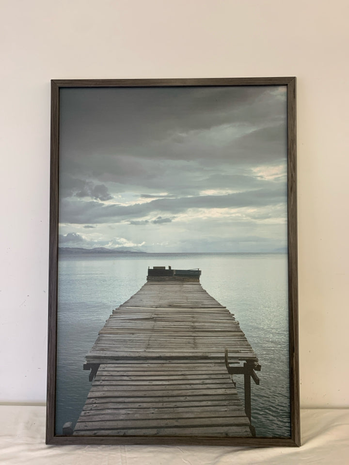 OLD DOCK PIER PRINT IN A GREY FRAME.