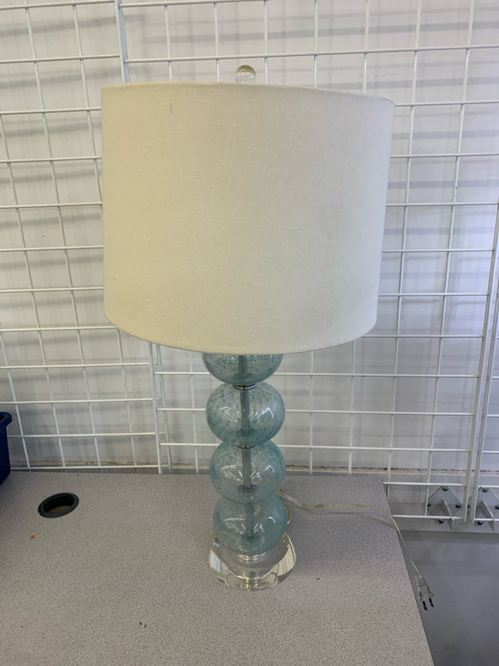 BLUE STACKING GLASS BALL BASE W/ CREAM SHADE.