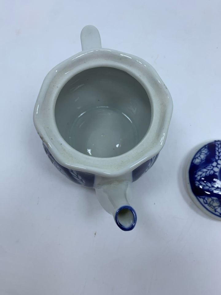 COBALT BLUE TEAPOT W/LEAF PATTERN.