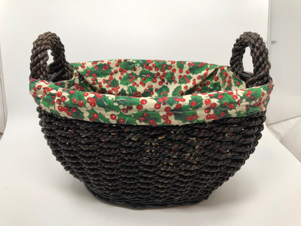 BROWN WICKER BASKET W/HOLLY FABRIC INSERT.