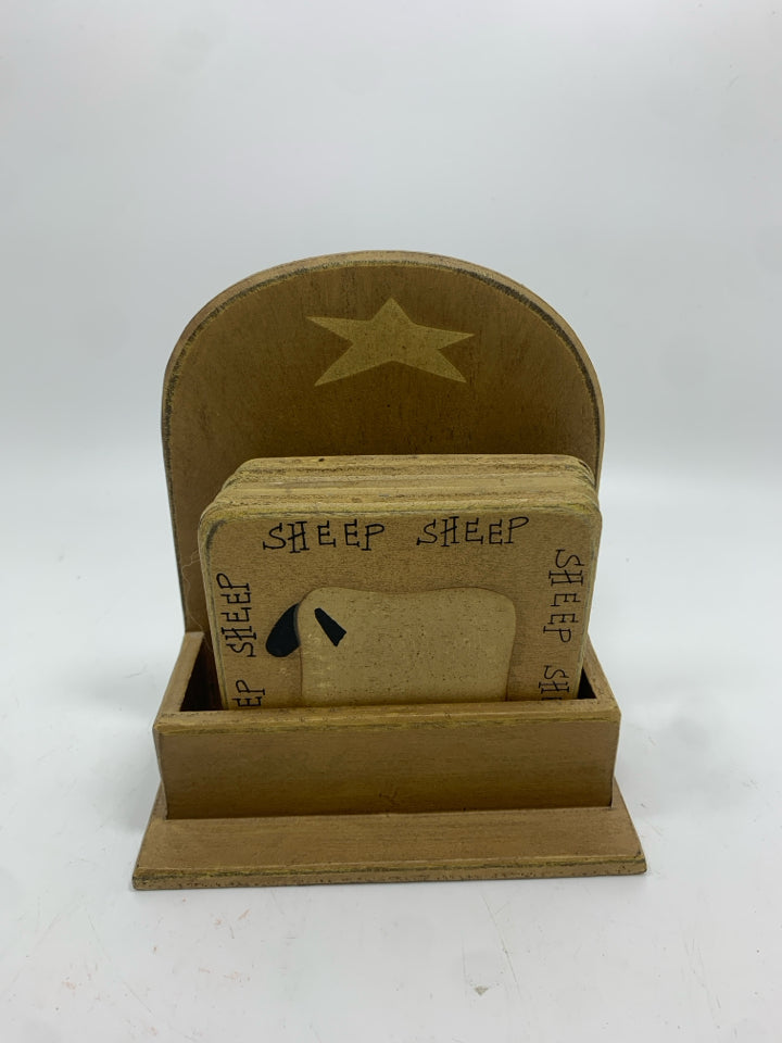 5PC PRIMITIVE COASTERS IN HOLDER.