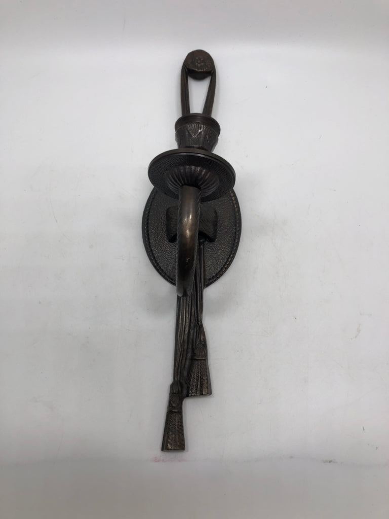 BROWN METAL TAPER CANDLE WALL SCONCE.