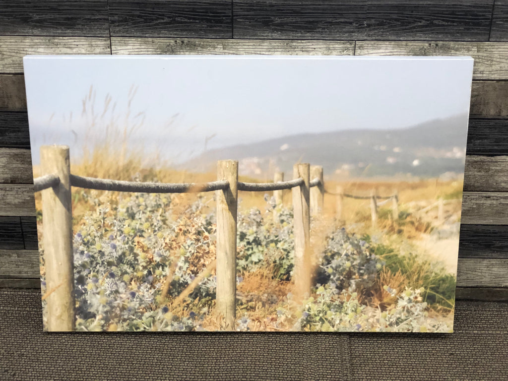 PURPLE FLORAL AND FENCE CANVAS WALL ART.