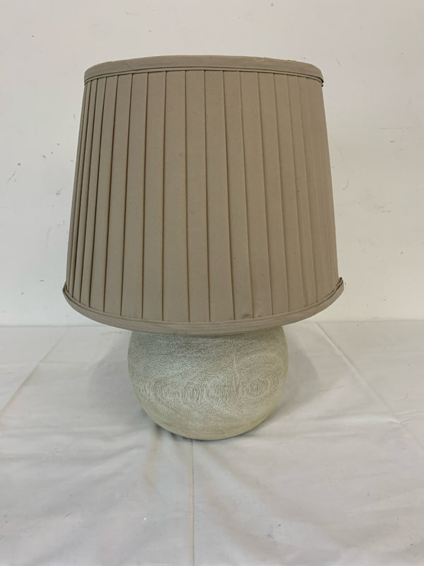 WHITE BASE AZTEC PATTERN LAMP W CREAM SHADE.