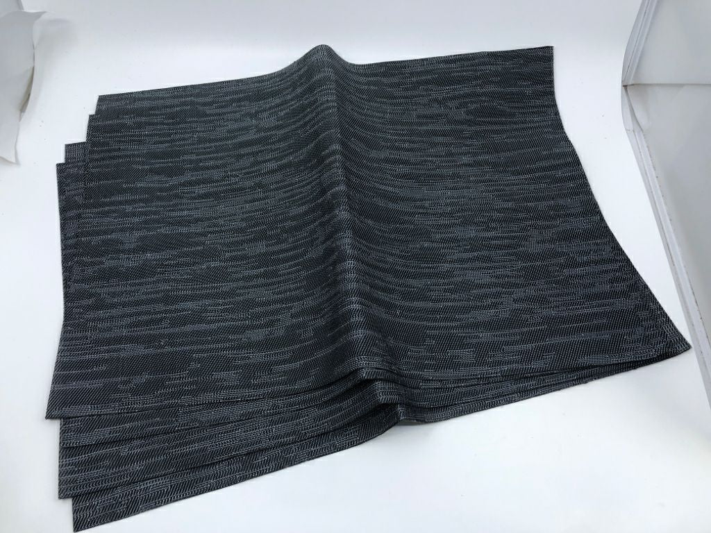 4 GREY PLASTIC PLACEMATS.