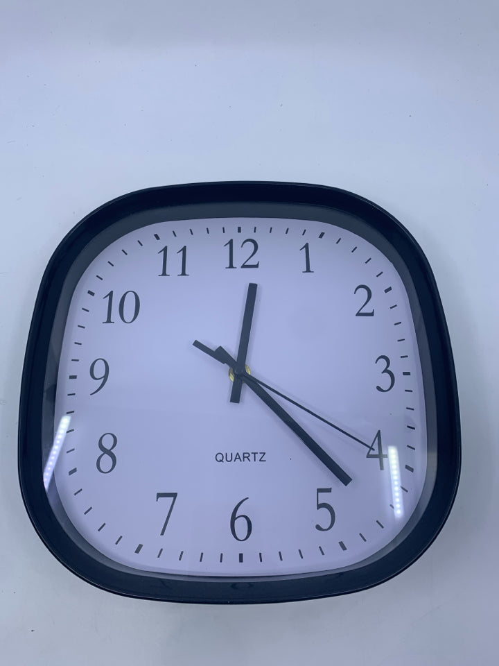 BLACK QUARTZ ROUNDED SQUARE CLOCK.