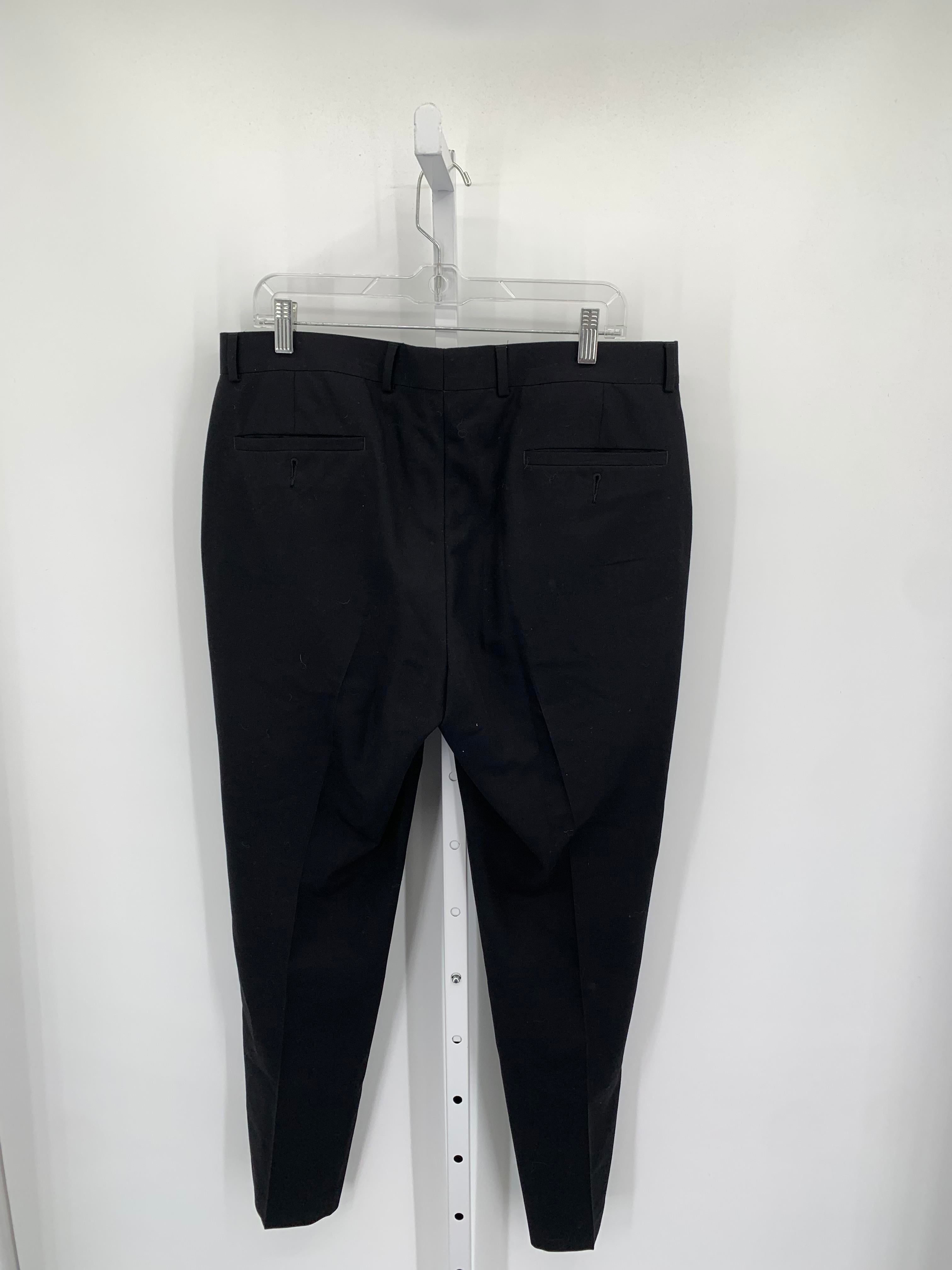 FLAT FRONT PANTS.