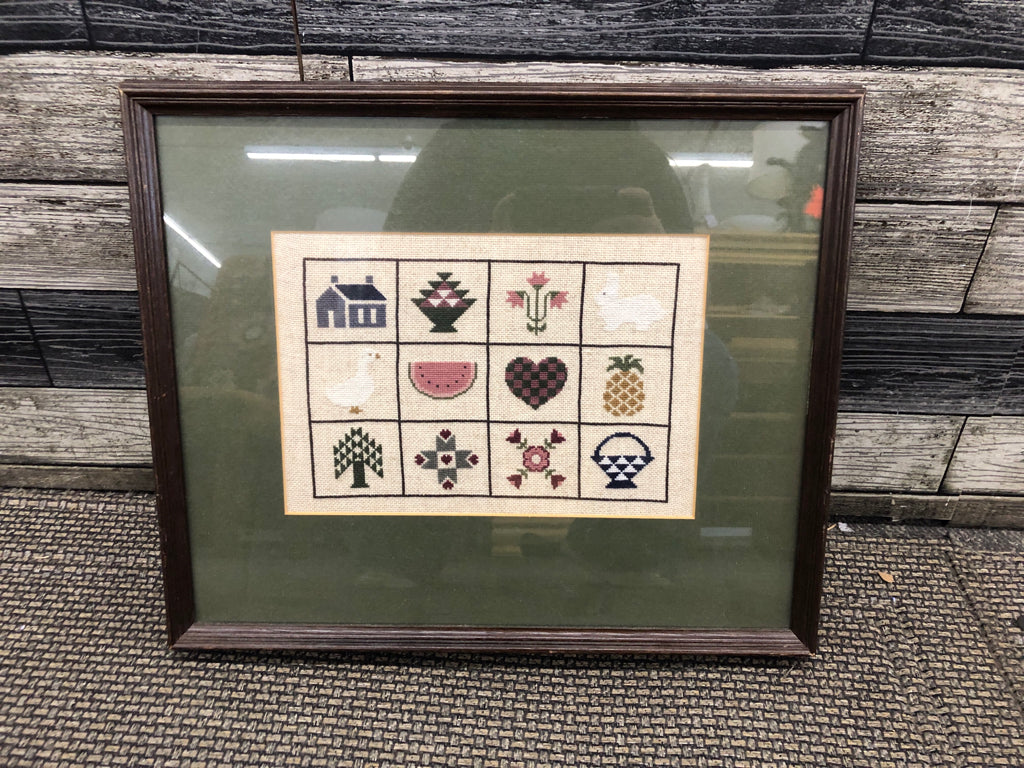 VTG EMBROIDERED IN DARK WOOD FRAME WALL ART.