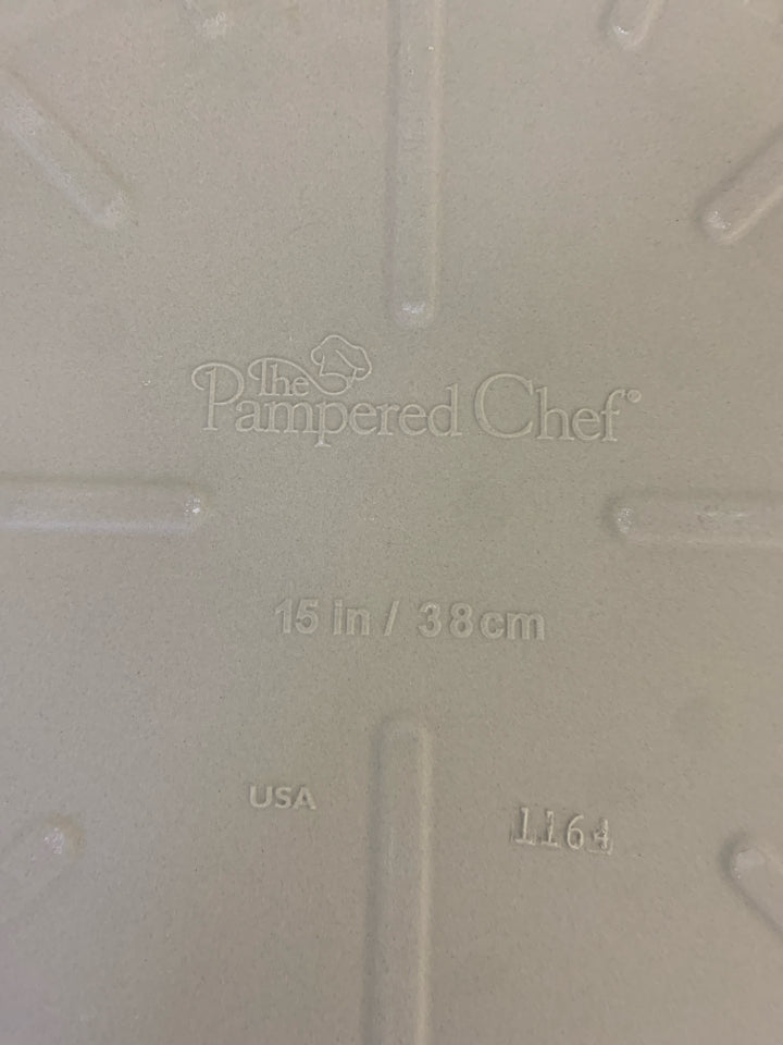 NIB PAMPERED CHEF LARGE ROUND STONE W HANDLES.