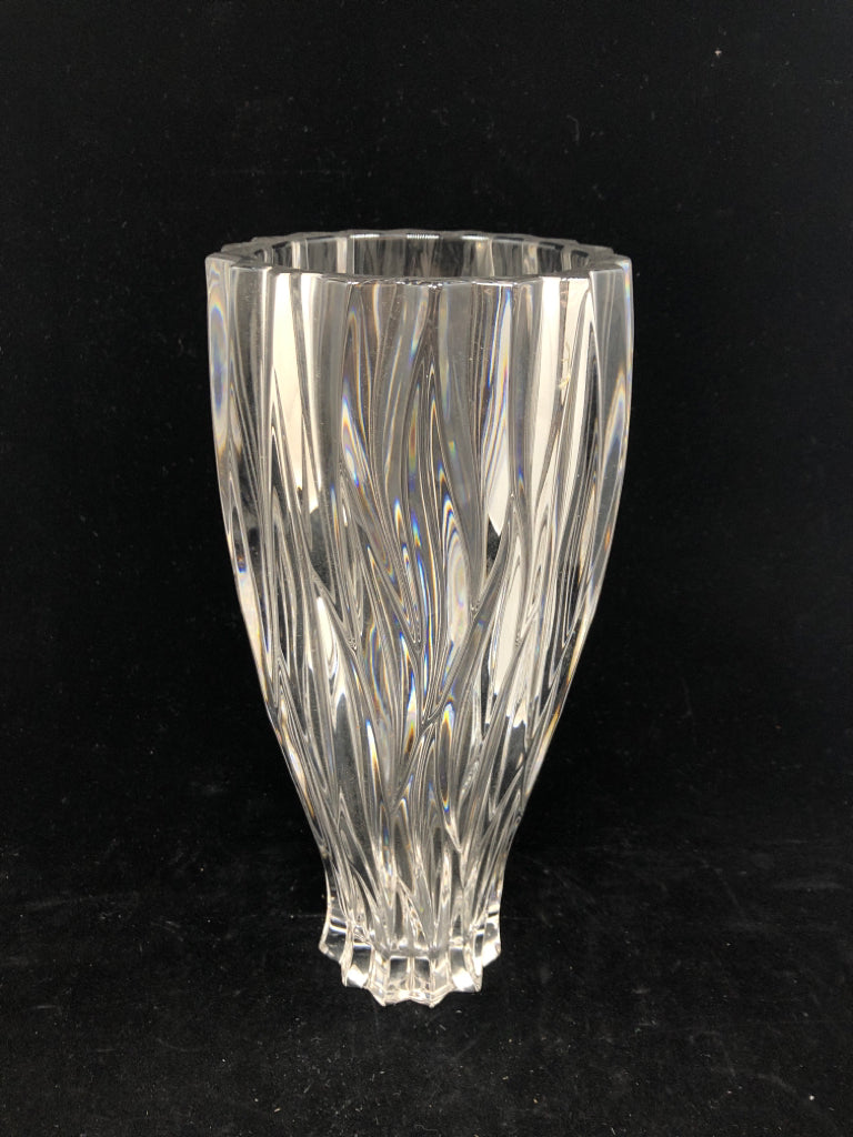 HEAVY WAVY CUT GLASS VASE.