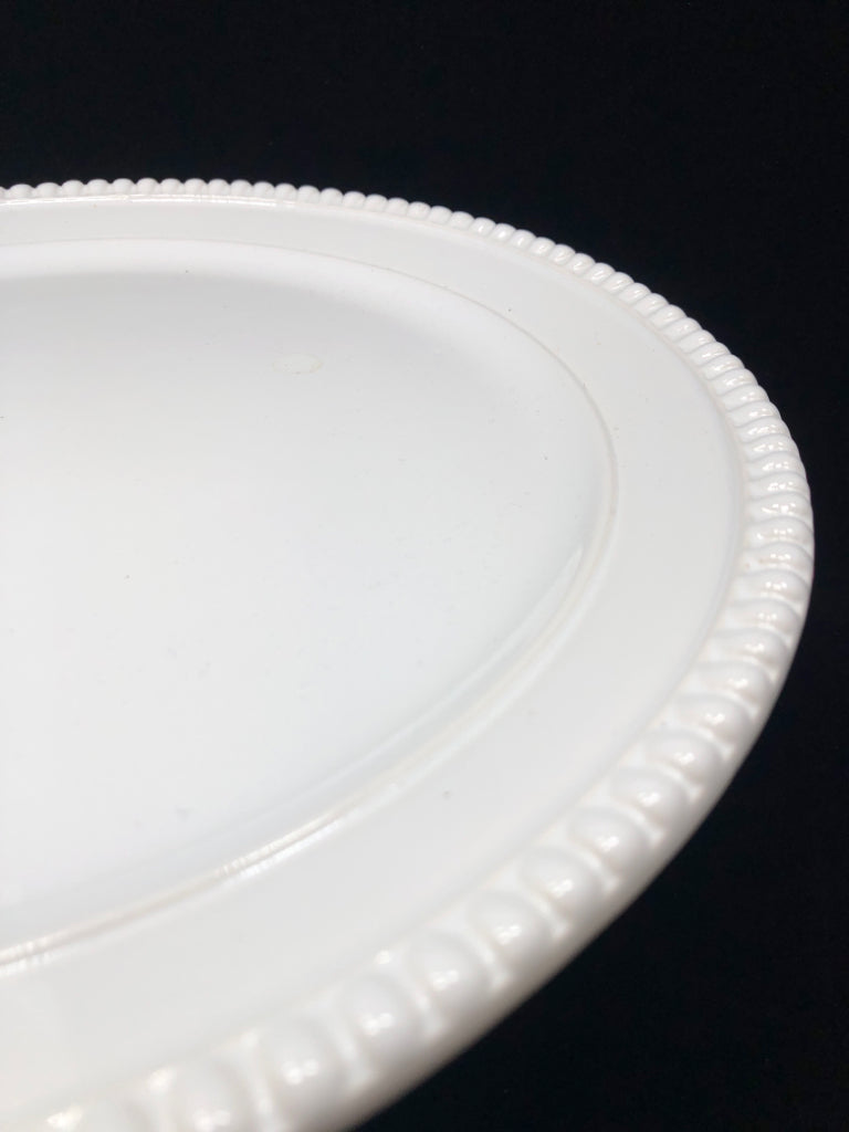 RAISED WHITE CAKE STAND W/GLASS COVER.