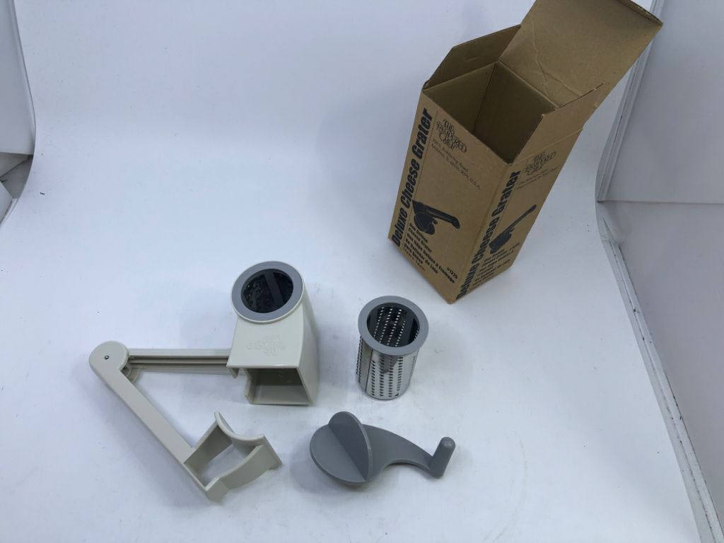 NIB PAMPERED CHEF CHEESE GRATER.