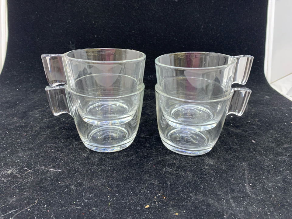 4 CLEAR GLASS MUGS.