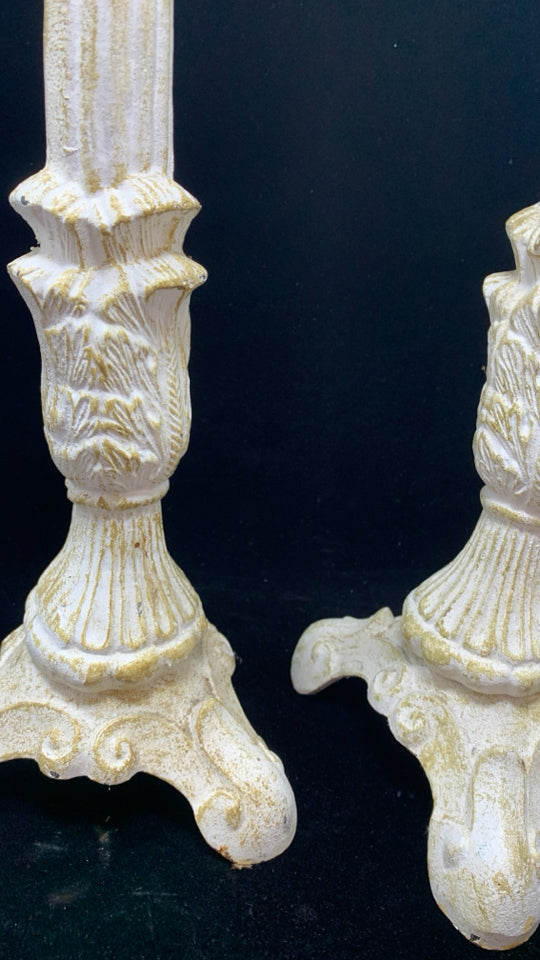 2 DISTRESSED WHITE METAL CANDLE STICK HOLDER.