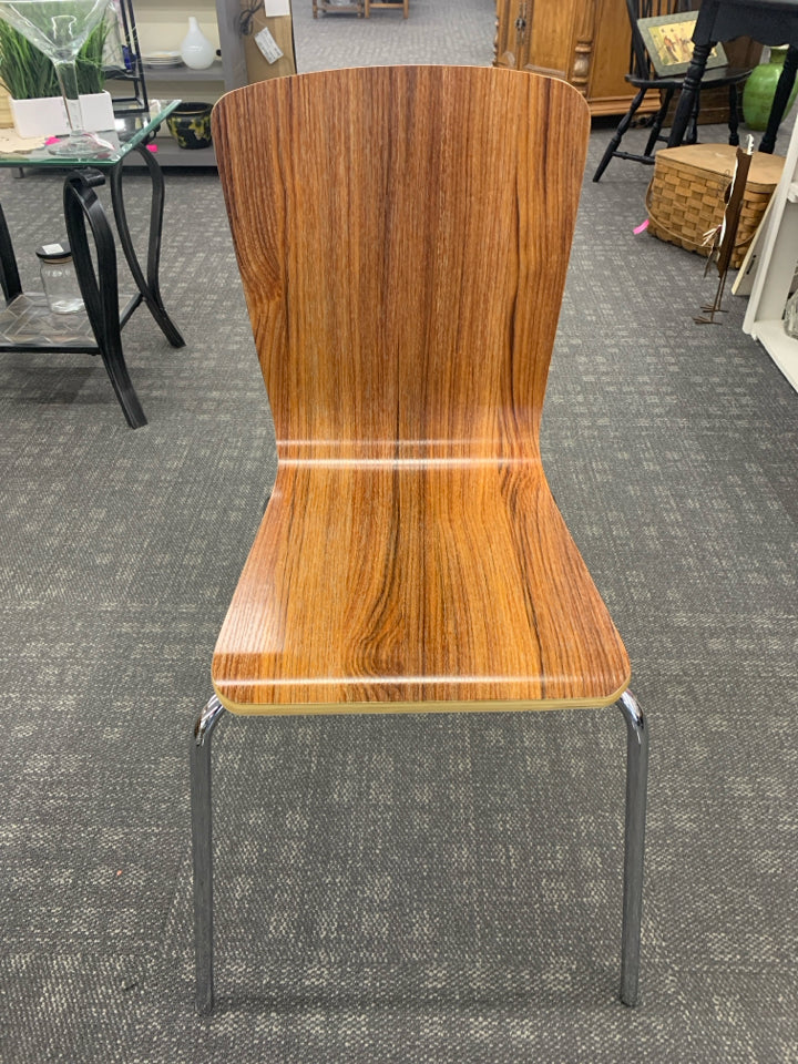 LAMINATE WOOD DESK CHAIR W/ SILVER LEGS.