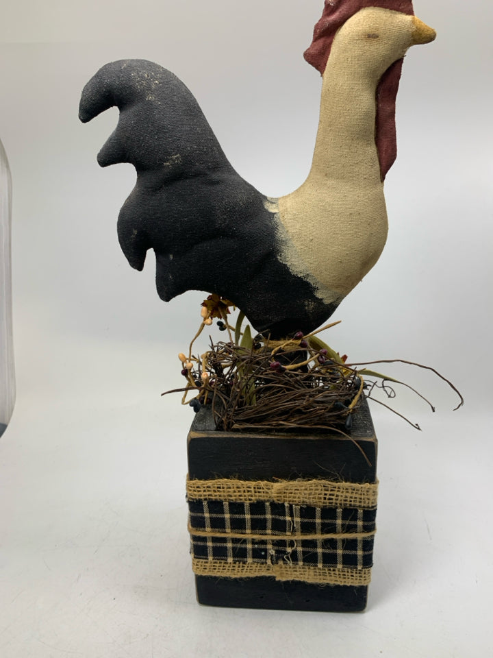 PAINTED BURLAP ROOSTER IN BLACK PLANTER.