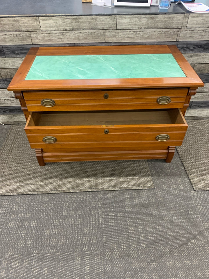 CHERRY WOOD CABINET W 3 DRAWERS AND GREEN MARBLE TOP.