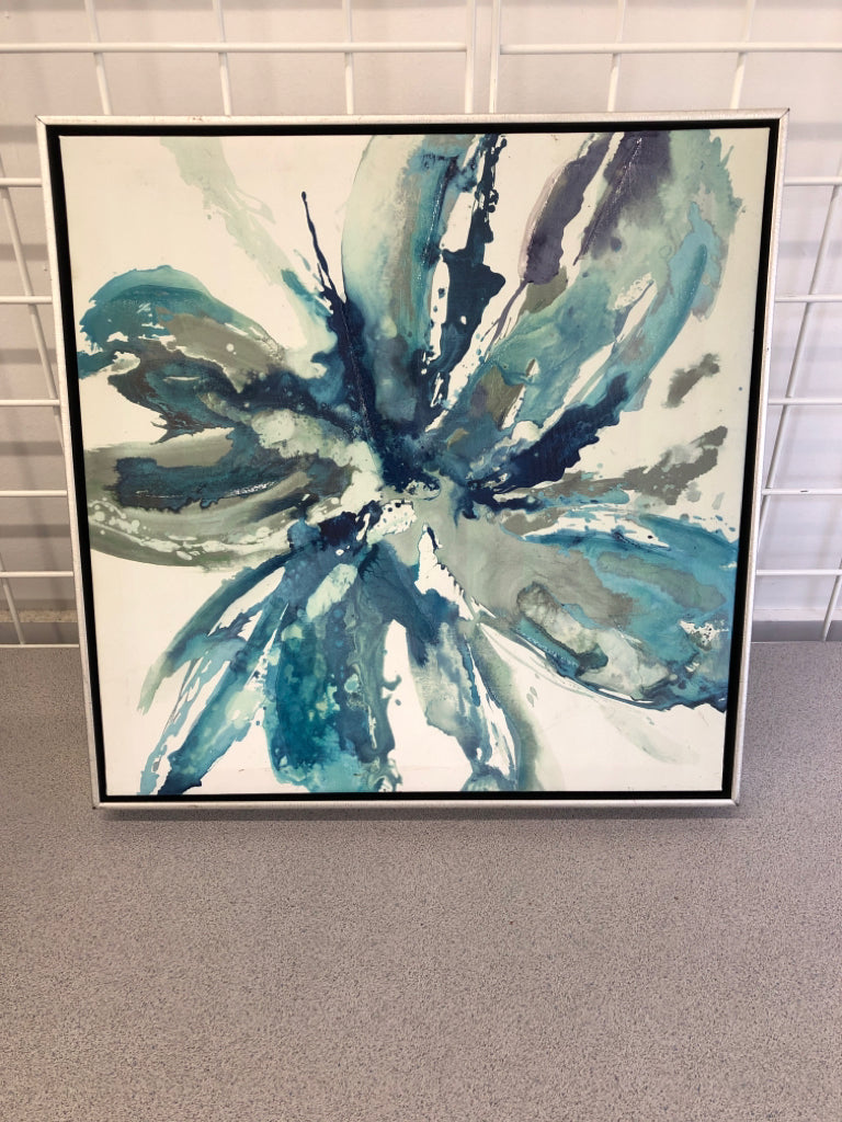 BLUE WATERCOLOR STYLE FLOWER ON FRAMED CANVAS.