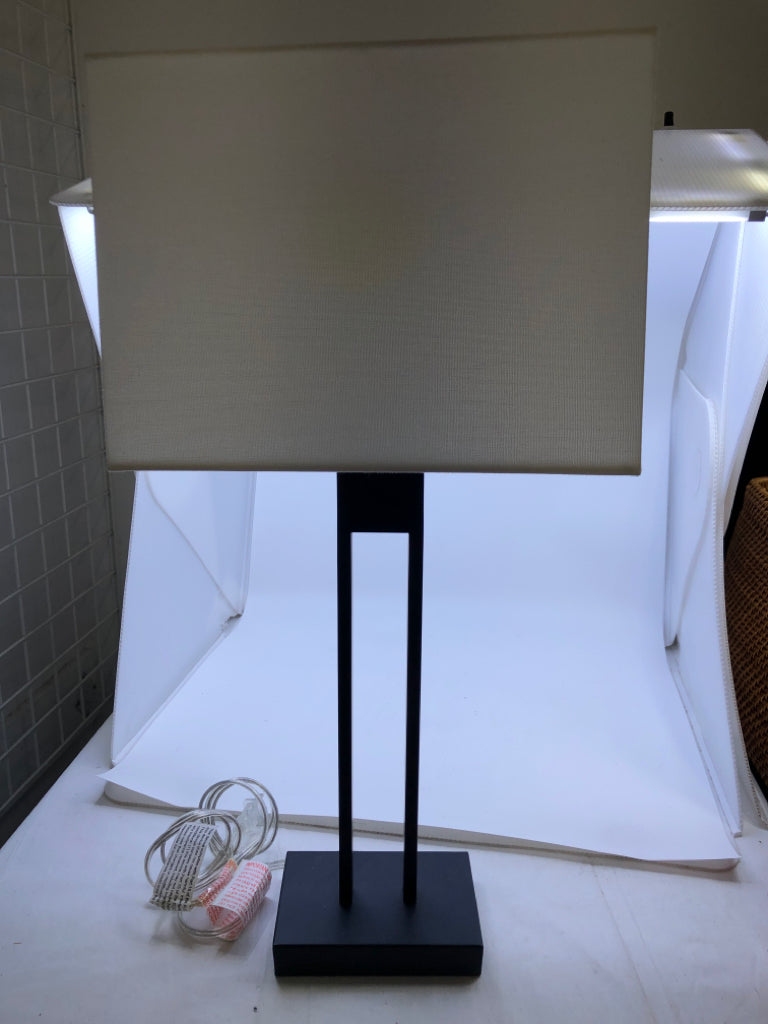BLACK SQUARE AND WHITE SHADE LAMP.